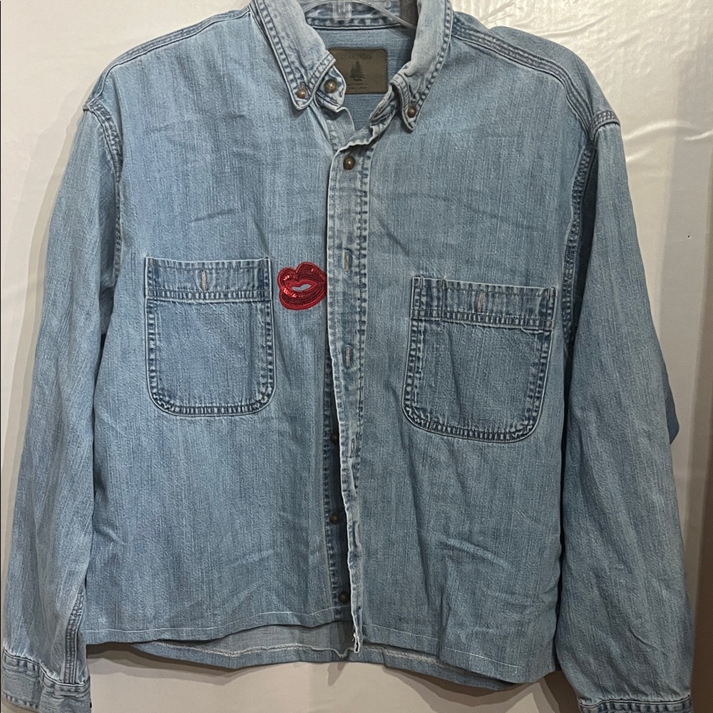 Light Blue Jean Jacket. Cropped and have designs on front and back.’